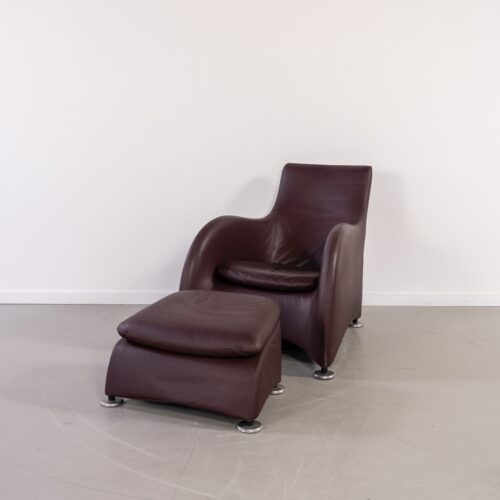 Montis Loge Fauteuil + Voetenbank Aubergine Leder